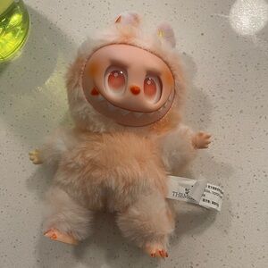 Pink fuzzy monster doll keychain